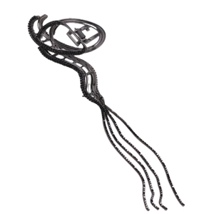 Elegant metallic snake-shaped hair claw clip with tassels and dark gunmetal finish
