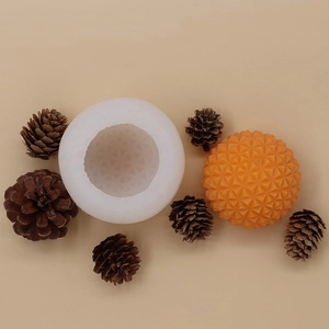 Stampo in silicone 3D per candele a sfera con motivo a diamante e prodotto finito arancione