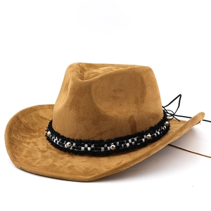Brown suede cowboy hat featuring a black and white woven ribbon with silver metal beads