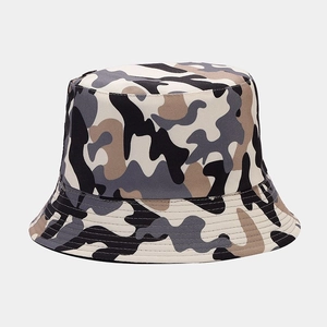 Close-up of camouflage bucket hat showing durable canvas fabric and fine brim stitching