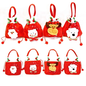 Assorted Christmas felt gift bags featuring Santa, snowman, and reindeer designs