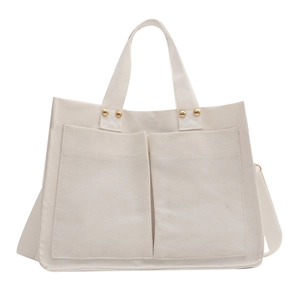 Sac fourre-tout en toile blanche minimaliste avec deux poches avant et bandoulière réglable