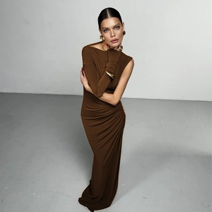 Detail view of ruching on the dark brown bodycon dress with asymmetric neckline