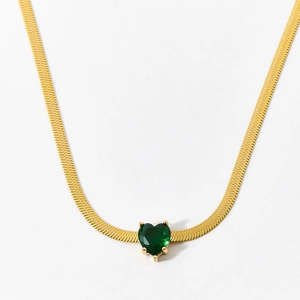 Minimalist gold snake chain necklace with a heart-shaped green zircon stone pendant