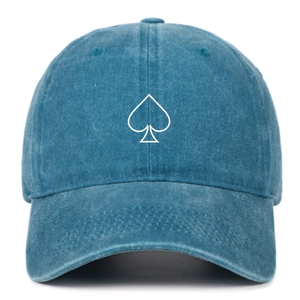 Detail of spade embroidery on navy blue washed cotton baseball cap with retro style