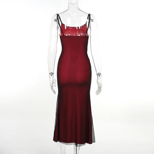 Detail view of the back of a dark red maxi dress with black mesh overlay and thin straps