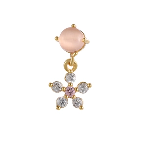 Detail of pink cat eye stone and floral zircon drop earring in gold finish