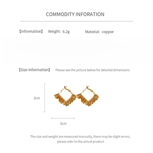 Detailed spec sheet showing gold leaf earrings with 3cm size and copper material specs
