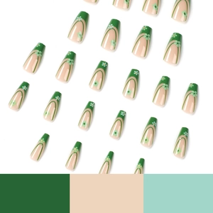 French tip press-on nails with dark green edges and light green flower designs