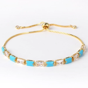 Adjustable gold chain bracelet with turquoise and clear rectangular cubic zirconia stones