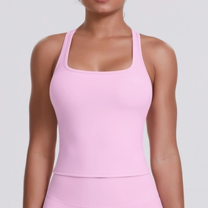 Detail of square neckline on pink athletic tank top with smooth moisture-wicking fabric