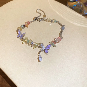 Close-up of a butterfly zircon bracelet with colorful crushed stones and adjustable clasp