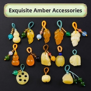 Exquisite amber resin pendants with traditional gourd and leaf shapes on dark background