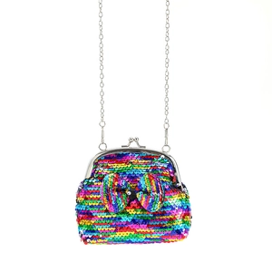 Detail of rainbow sequin coin purse featuring a bow decoration and silver metal chain