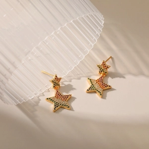 Bohemian gold star earrings with colorful cubic zirconia in a double star design
