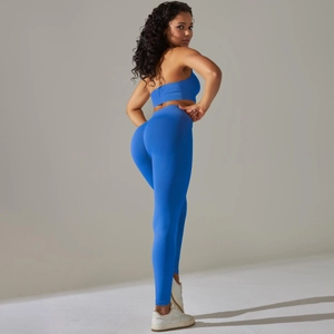 Detail of Klein blue seamless ribbed yoga set featuring open back top and high waist leggings