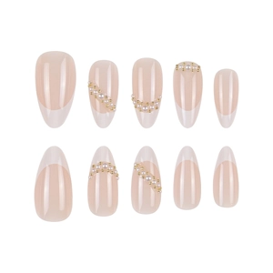 Almond-shaped press-on nails in nude pink with white French tips and pearl embellishments