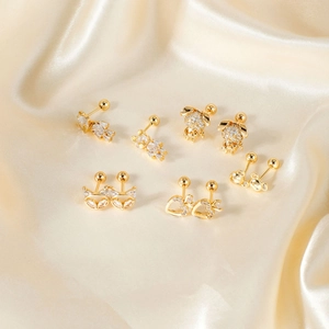 Exquisite gold-plated copper earrings with zircon, featuring turtle and fox head designs