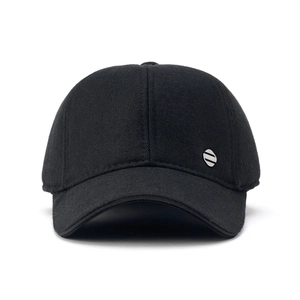 Detailed close-up of a black wool blend baseball cap featuring a metal Sport badge logo