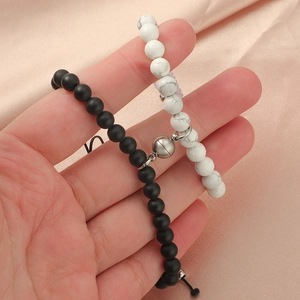 Magnetic couple bracelets set with matte black agate and white turquoise beads