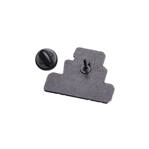 Detail of the black alloy badge back showing secure pin and black rubber clutch backing