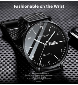 Detail view of 42mm quartz watch with dual calendar display and black mesh strap
