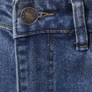 Classic blue washed denim jeans featuring bronze metal buttons and yellow contrast stitching