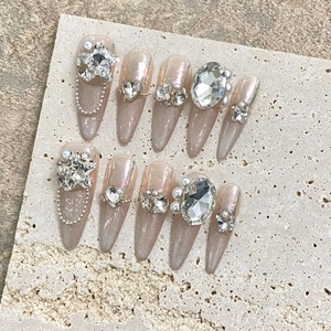 Luxury handmade almond cat-eye press-on nails with sparkling rhinestones and pearls