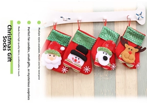 Set of 4 Christmas stockings featuring Santa, snowman, bear, and reindeer with sequins
