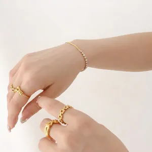 Elegant gold plated chain ring and rhinestone bracelet set for a minimalist luxury look