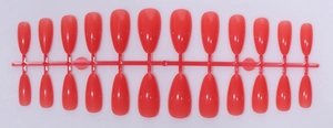 Top view of 24 pieces of glossy red almond press-on nails arranged on a plastic rack