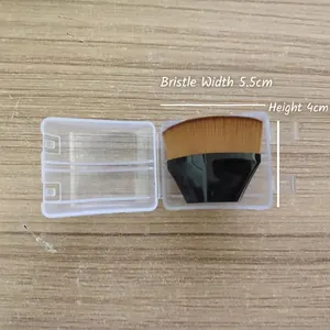 Detail of 55mm foundation brush with dense bristles and a clear portable storage case