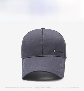 Front view of grey baseball cap showing structured crown and fashion rubber patch