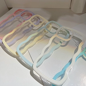 Pastel wave border phone cases for iPhone in pink, purple, yellow, and blue colors