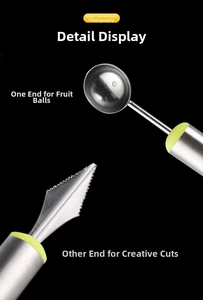 Close-up of stainless steel dual-head fruit scooper and carving knife with green handle