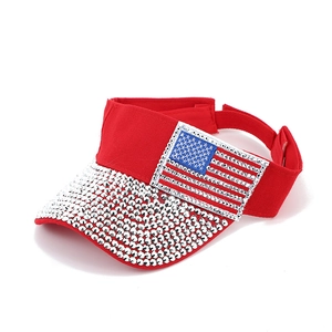 Red open top sun visor with sparkling American flag rhinestone patches and adjustable strap
