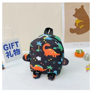 Detailed close-up of cartoon dinosaur backpack with 3D elements and tropical print