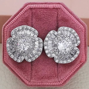 Classic camellia stud earrings with zircon inlay in a pink velvet jewelry box
