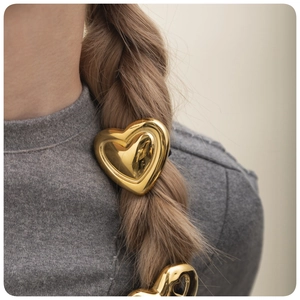 Elegant 18k gold plated heart zircon hair tie on model for a luxury minimalist hairstyle