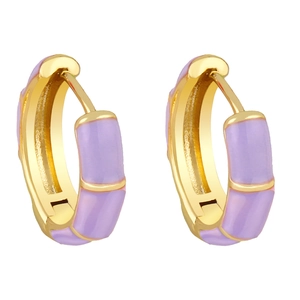 Detailed view of lavender enamel and gold plated brass hoop earrings with segmented design
