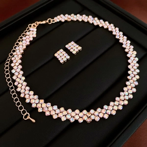 Macro detail of rectangle pearl and zircon necklace set with rainbow rhinestone sparkle
