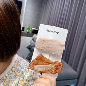 Creative food hair clips featuring realistic raw and grilled meat slice designs on card