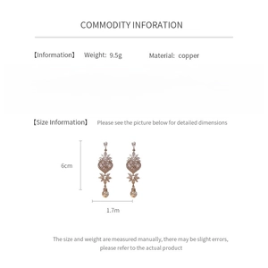 Detailed size chart for pearl heart earrings showing 6cm length and silver needles