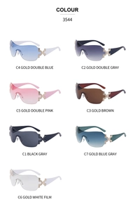 Detailed color palette of rimless Y2K sunglasses with rhinestone accents and metallic hinges