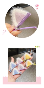 Detailed view of colorful plush kitten ear hair clips with durable metal alligator grips