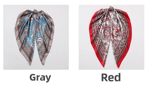 Detail of silk square scarves featuring vintage paisley prints in grey and red colors