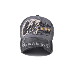 Detail of vintage washed baseball cap with Indian chief embroidery and distressed brim