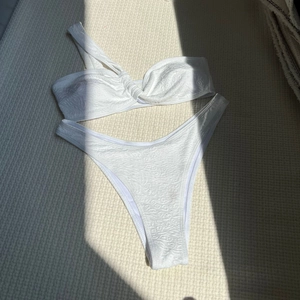 White relief texture bikini set with one-shoulder twist top and high-cut bottom