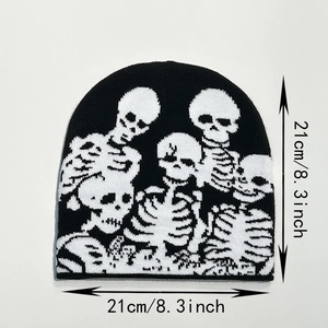 Detailed size specifications of black knit beanie with white skull pattern, 21cm by 21cm