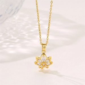 Golden maple leaf pendant with marquise-cut zircons on a delicate stainless steel chain